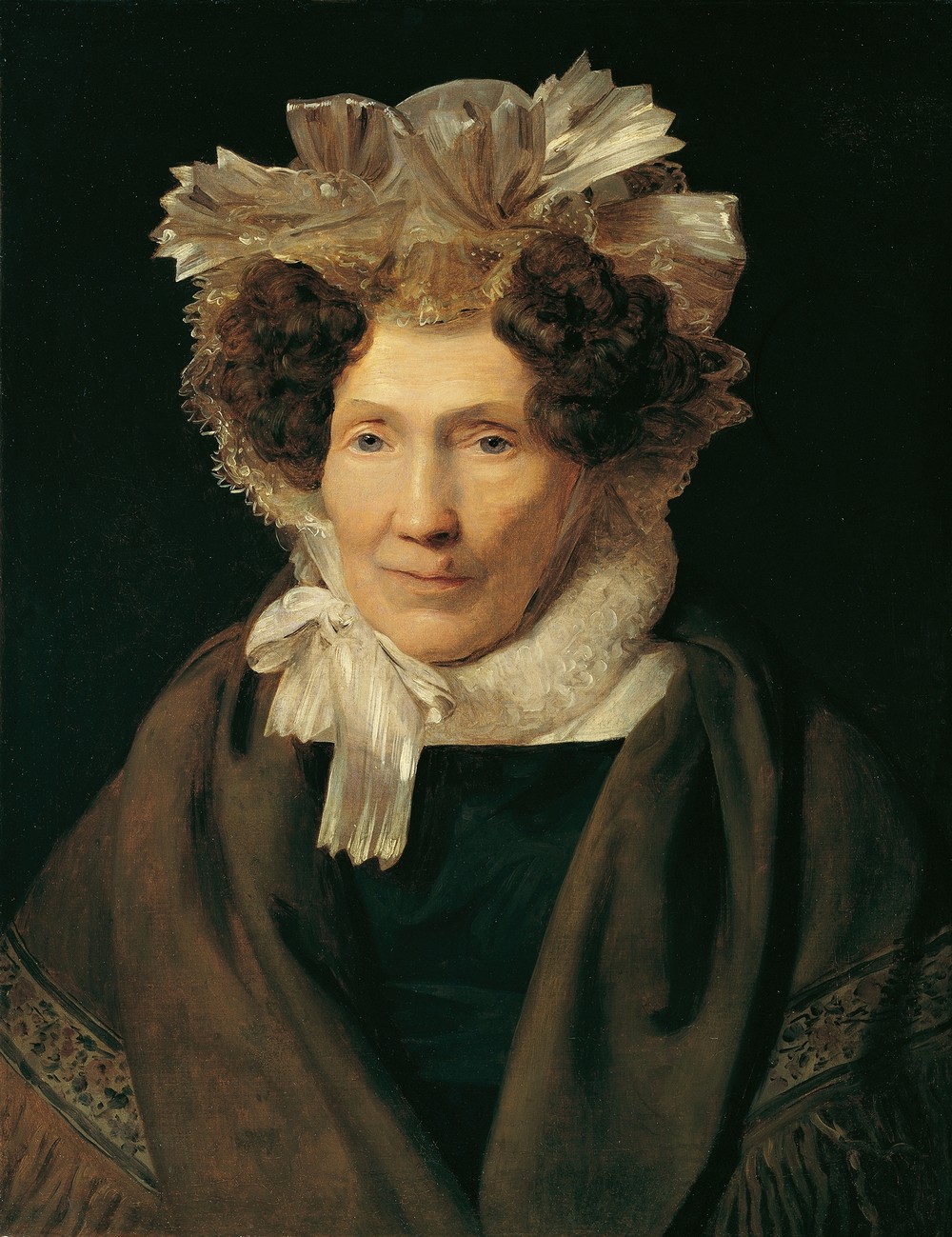 Alte Frau mit weißer Bänderhaube