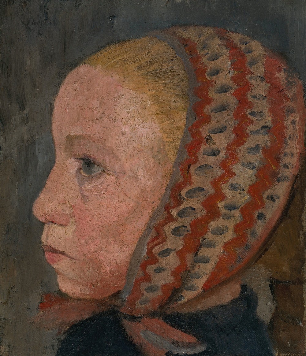 Girl’s head with a striped cap in profile to the left (circa 1905)