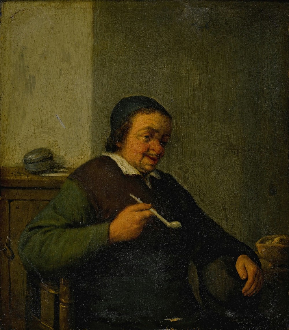 A man smoking in an interior