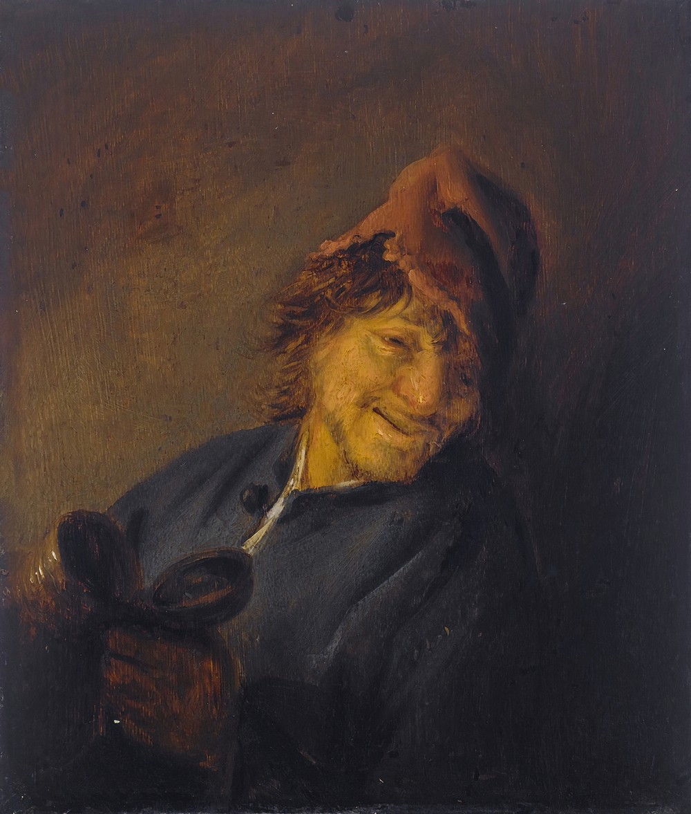 Peasant with a red cap holding a jug