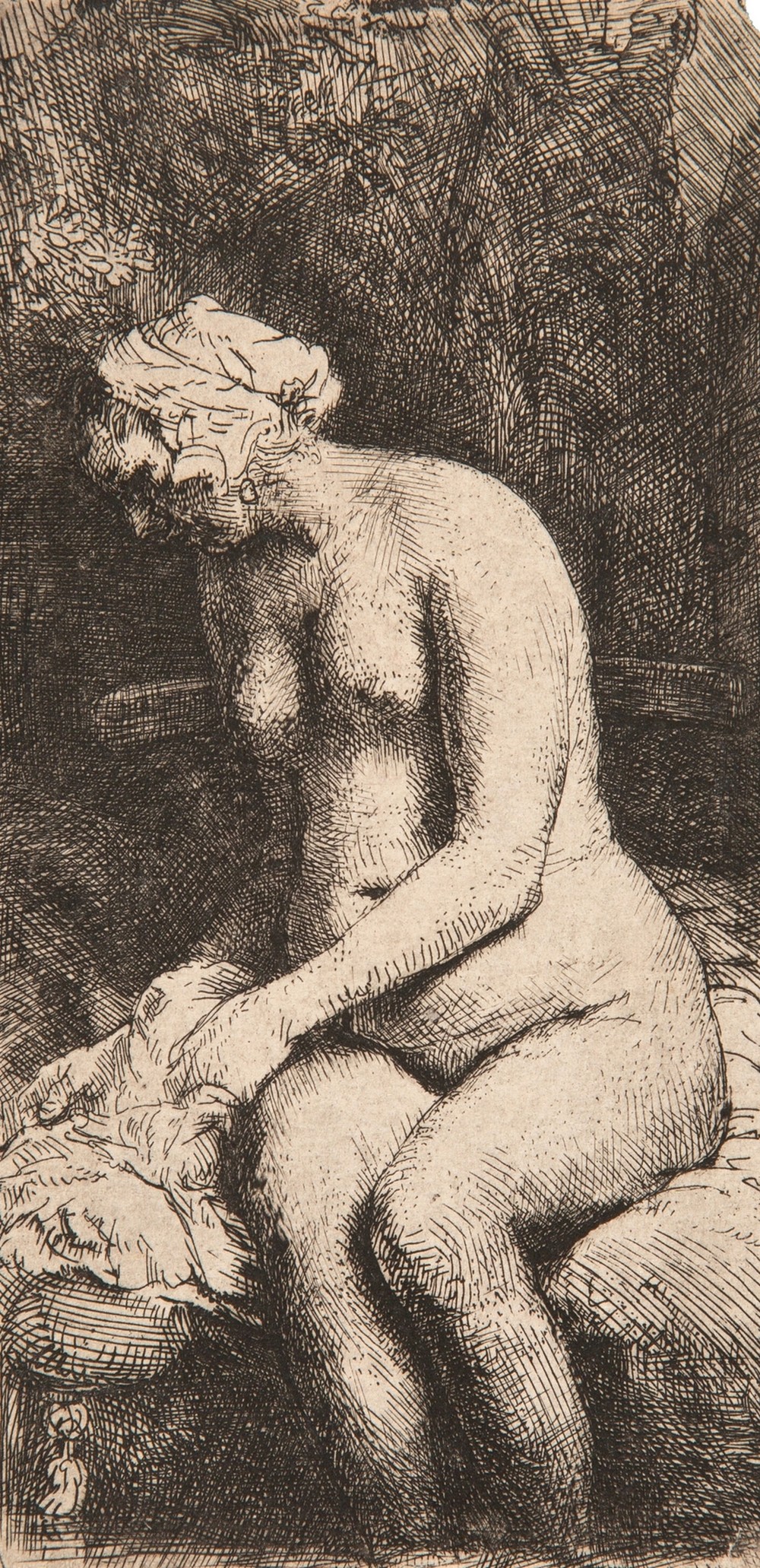 Woman bathing her feet at a brook