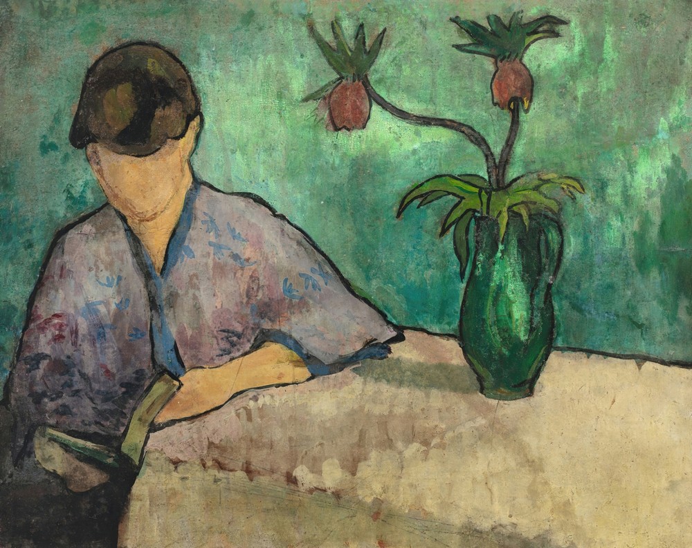 Jeune femme lisant en kimono