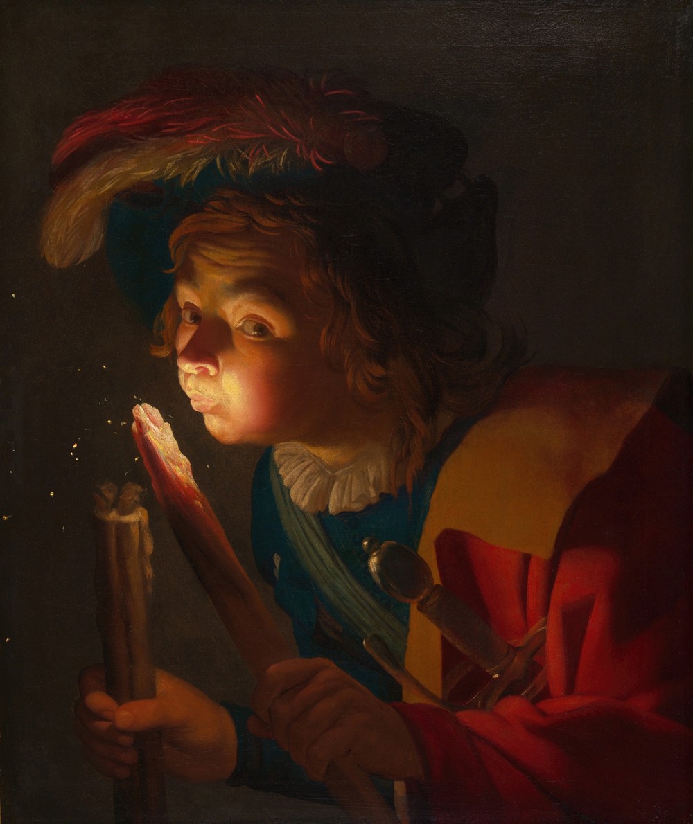 A Boy Blowing on a Firebrand (1621-22)
