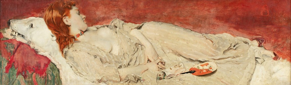 A young red-hair girl sleeping on a bearskin
