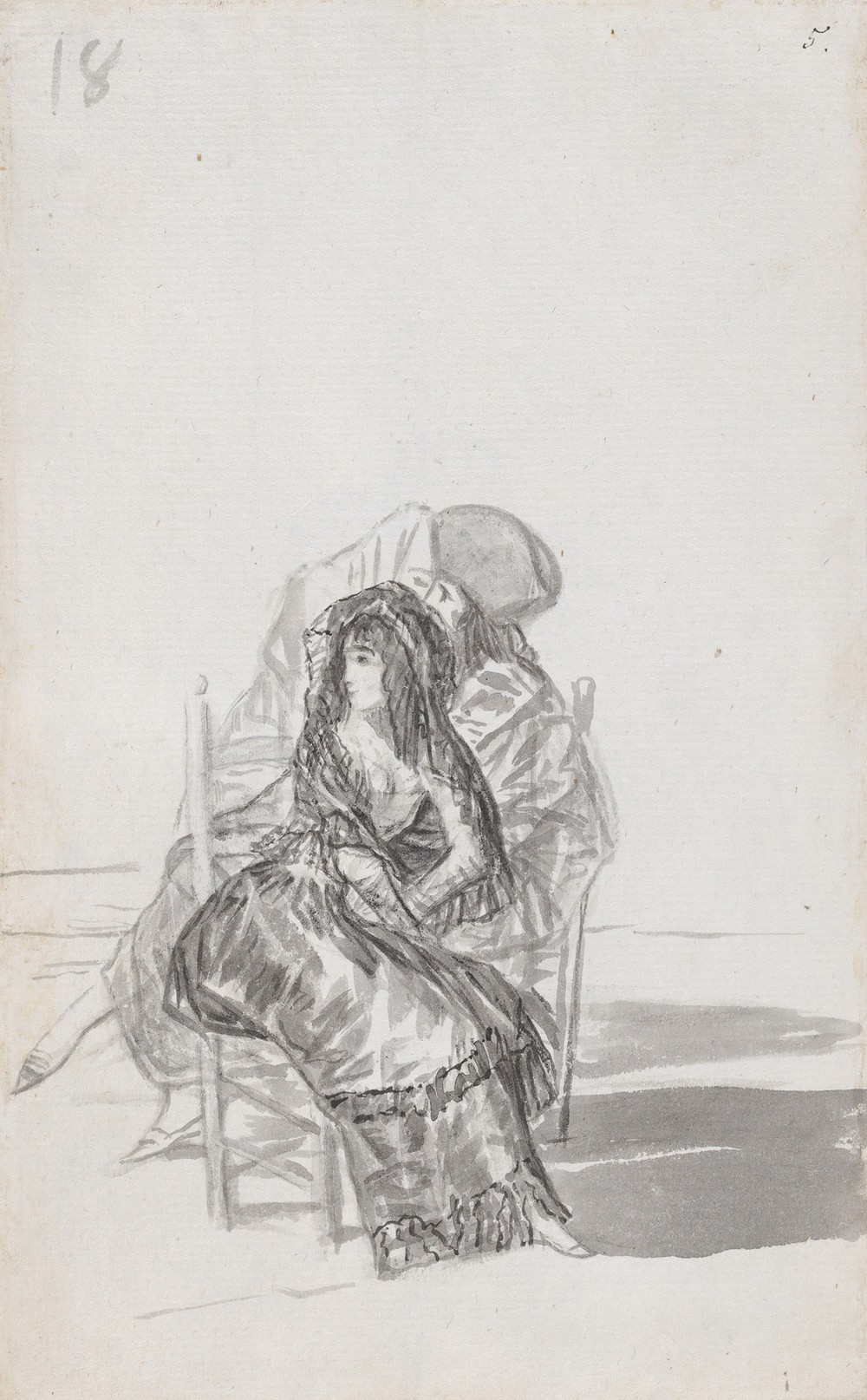 Maja seated on a chair and two companions behind