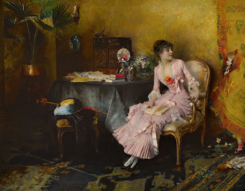 Jeune Femme En Rose Avec Son Enfant
