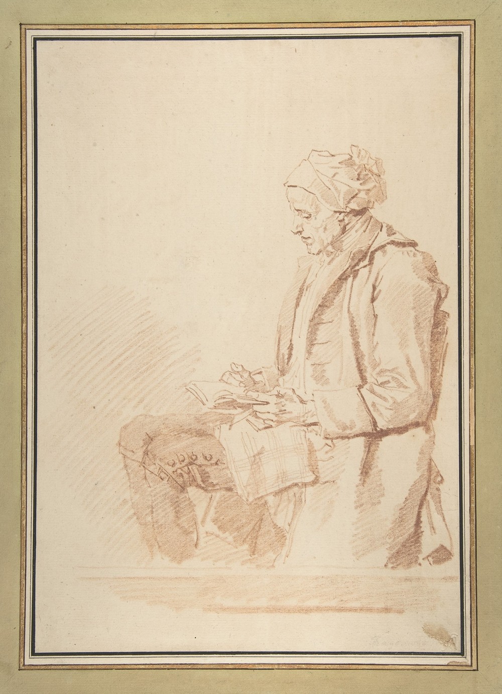 Seated Man Reading