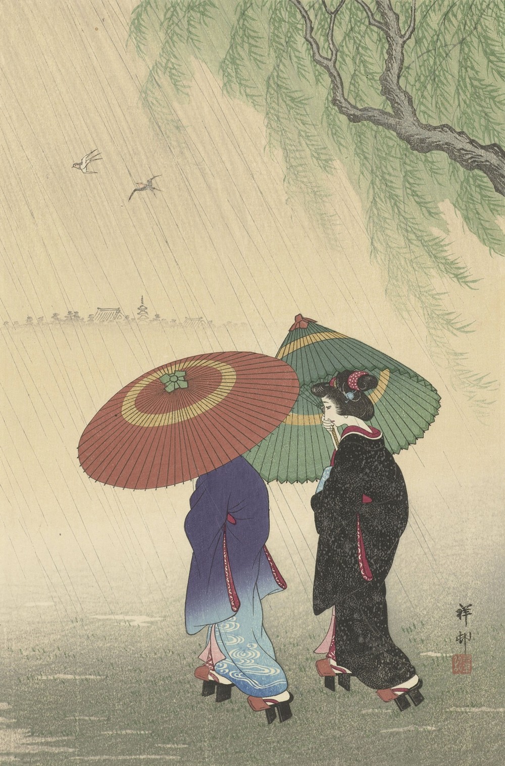 Two women in the rain
