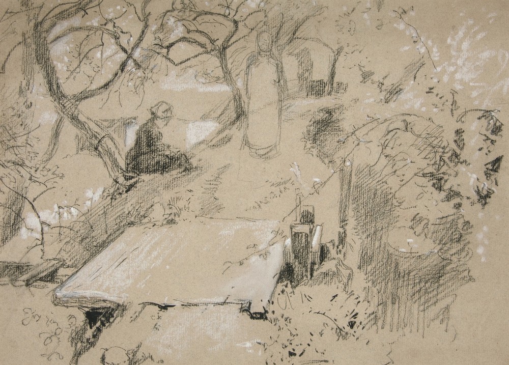 Woman seated on bench in a garden or public park