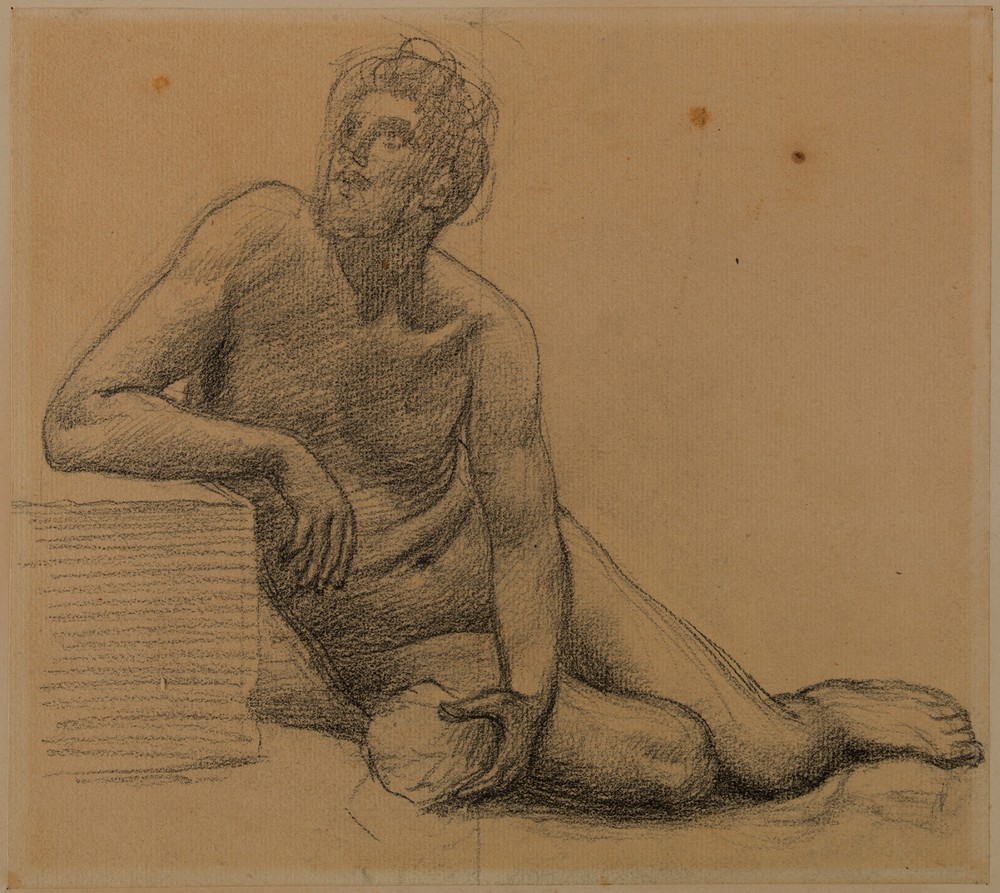 Homme nu assis par terre