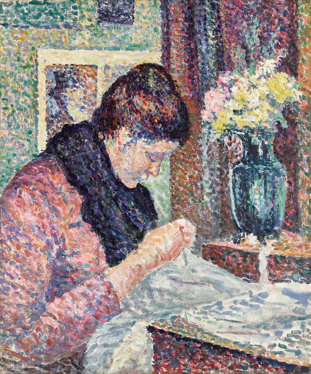 Femme cousant