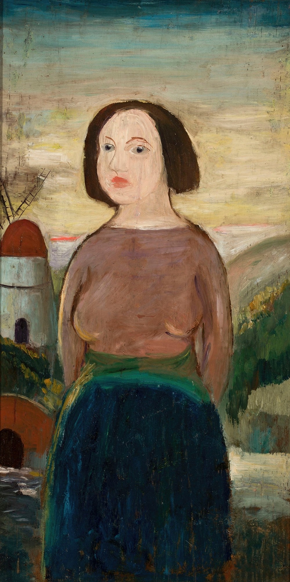 Girl against the background of a landscape with a windmill