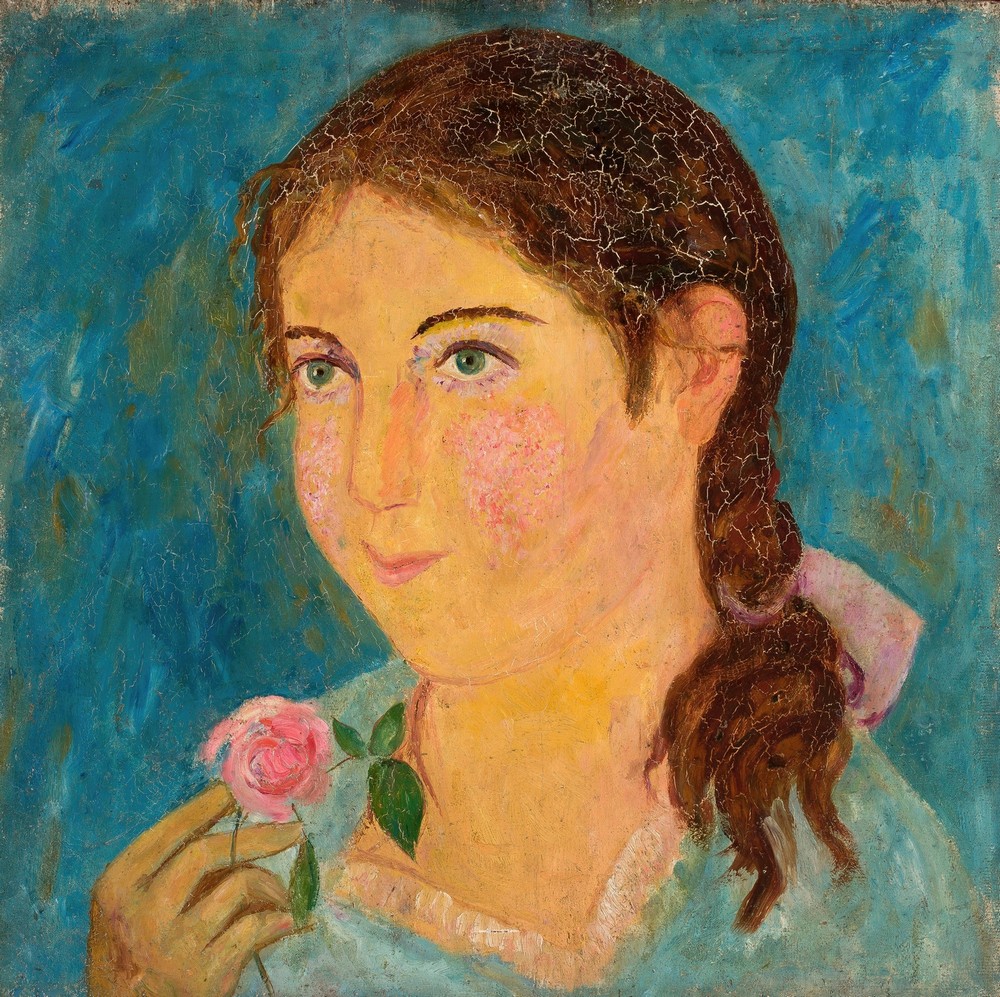 Girl holding a rose in her hand